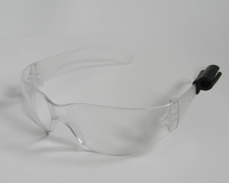Atticus Anderson Portfolio - Grip Clip: Pencil Hero on Safety Glasses, Spring 2013 Injection Molded Santoprene 40A and Safety Glasses Small black Grip Clip fitting firmly onto a pair of Safety Glasses.